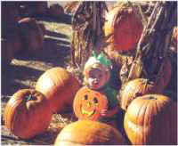Child with Pumpkins